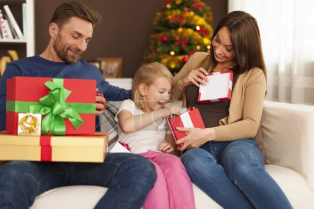 Family in christmas time with presents