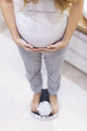 Pregnant woman controls her weight
