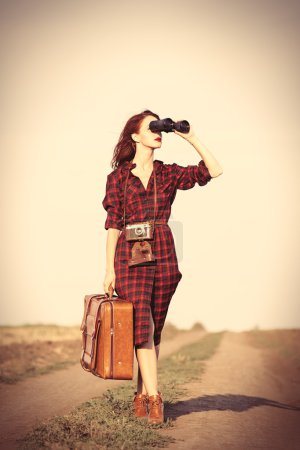 girl with bag and binocular