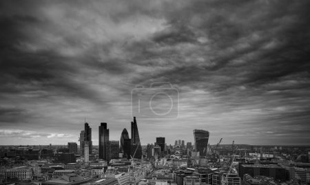 City of London financial district square mile skyline with storm