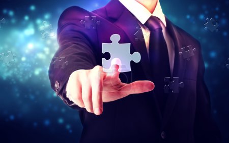 Piece of puzzle with businessman