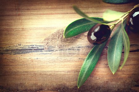 Olive over wood.