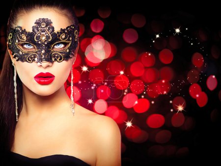 Woman wearing carnival mask