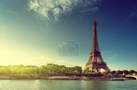 Seine in Paris with Eiffel tower in sunrise time 