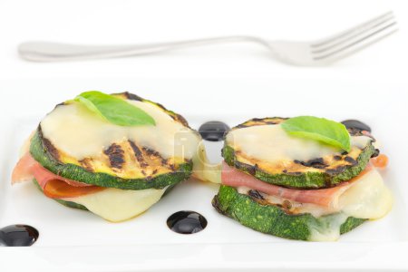 Grilled zucchini stuffed with ham and cheese