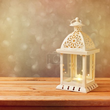 Decorative lantern with glowing candle