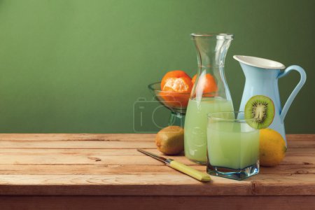 Fruit juice on wooden table