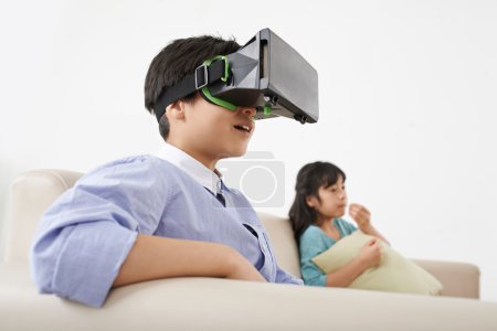 Boy in virtual goggles