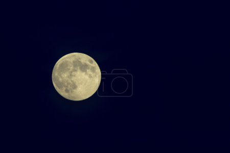 full moon on the night sky