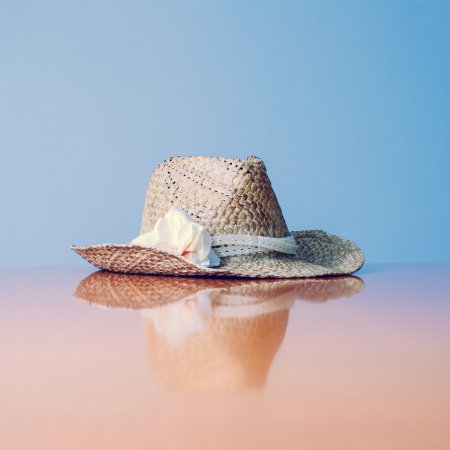 Still Life of Sunhat with Flower Accent