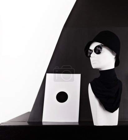 Mannequin wearing fashion sunglasses and hat