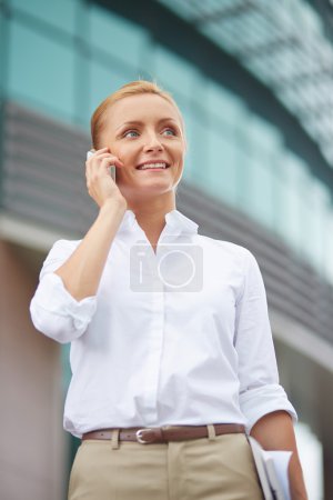 Businesswoman speaking on cellphone