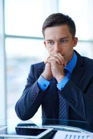 Businessman sitting at workplace