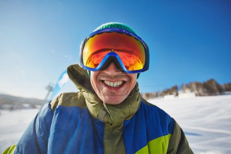 Smiling snowboarder