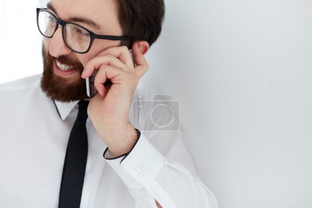 Businessman speaking on cellphone