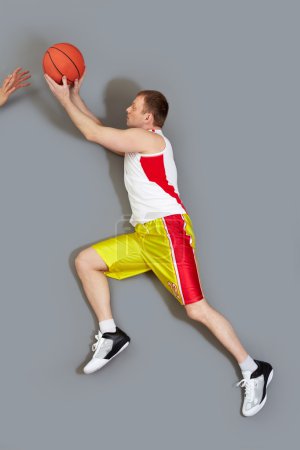 Muscular basketball player