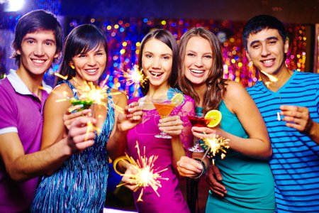 Friends toasting at New Year party