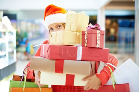 Young woman with Christmas presents