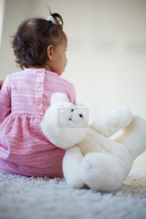 Little girl with teddy-bear