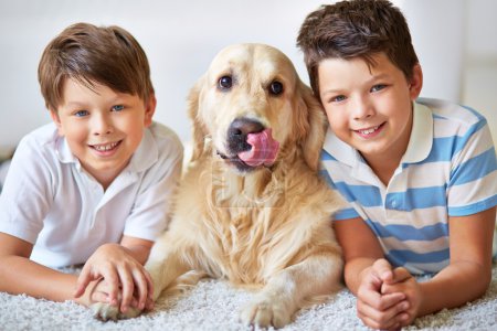 Happy brothers and dog