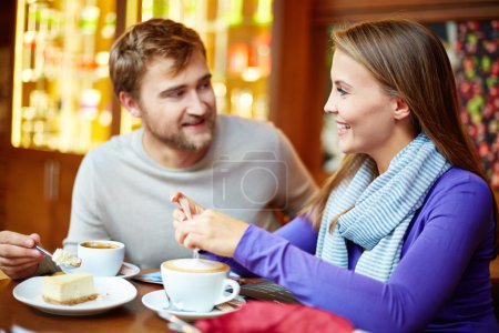 Couple spending time in cafe