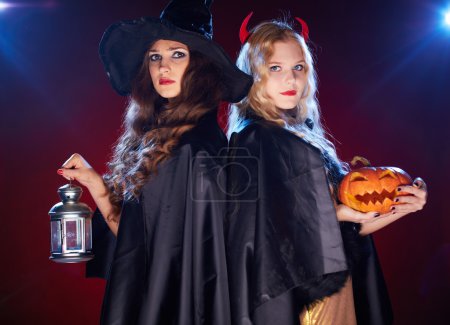 Two witches with lantern