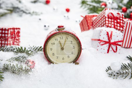 Alarm clock with snow and Christmas decorations