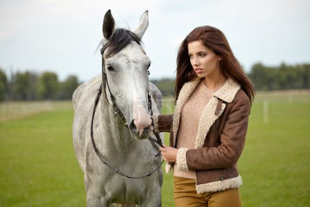 Woman with beautiful horse
