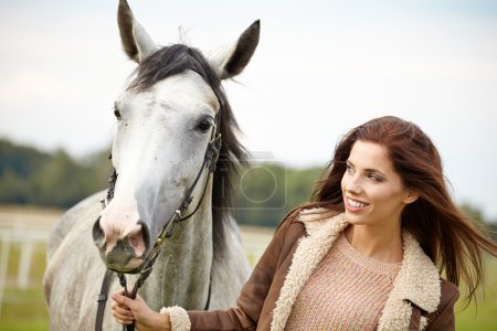 Woman with beautiful horse