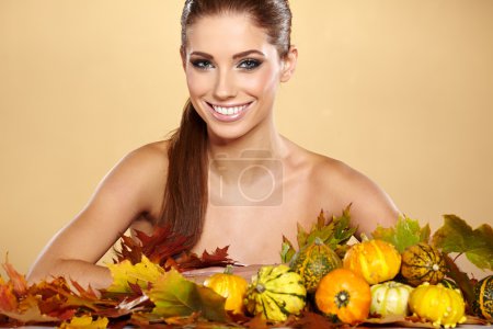 beautiful girl with pumpkin 