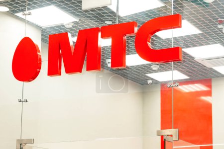 MTS sign. Official sales office of a major mobile operator. Close-up. Moscow, Russia, 03-31-2021.