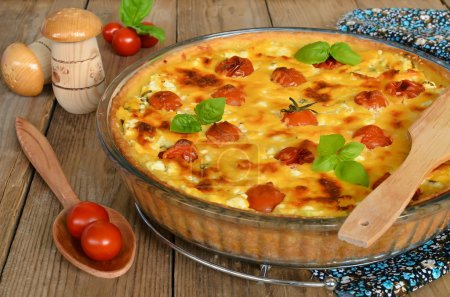 Tart with cheese and cherry tomatoes