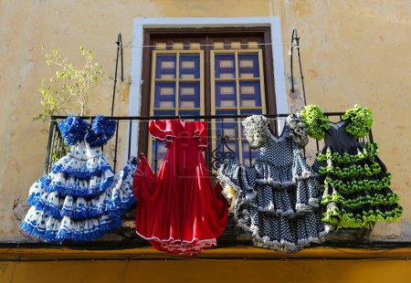 Traditional flamenco dresses at a house in Malaga, Andalusia, Sp