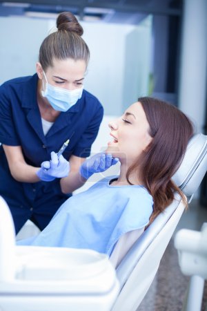 Woman visiting her dentist