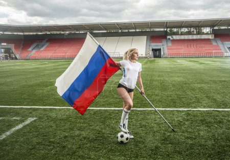 soccer fan with national flag 