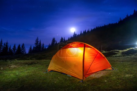 Illuminated orange camping tent