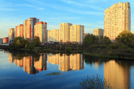 New residential district on the bank of the river Pekhorka during sunset. Balashikha, Moscow region, Russia