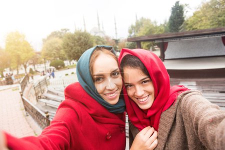 Arab Women Wearing Veil Taking Selfie in Istanbul