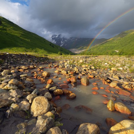 Rainbow in the mountains above the river