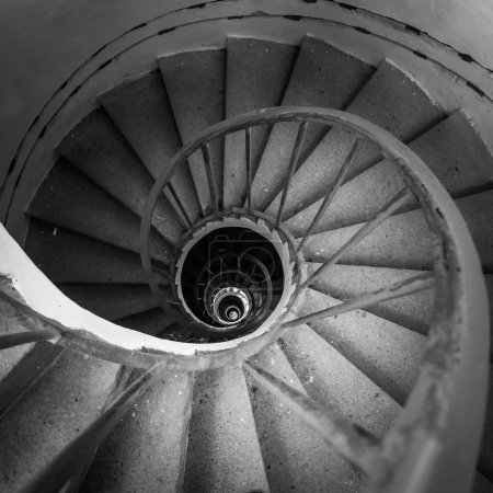 spiraling stairs black and white