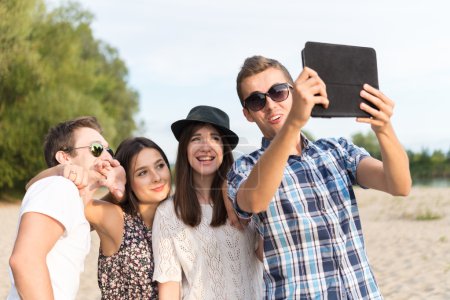 Group Of Young Adult Friends Taking Selfie