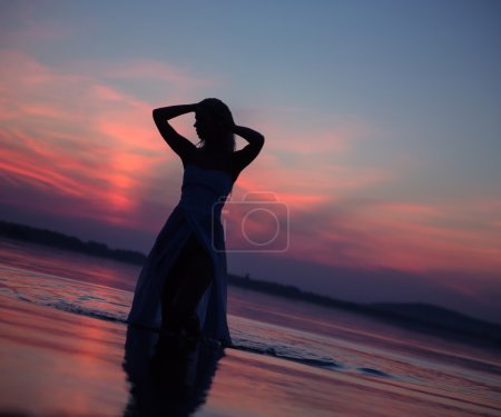 Lady's silhouette in the water
