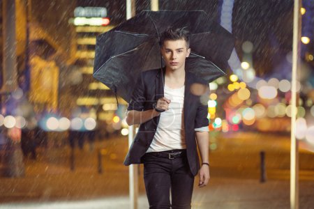 Art photo of the model walking in the rain