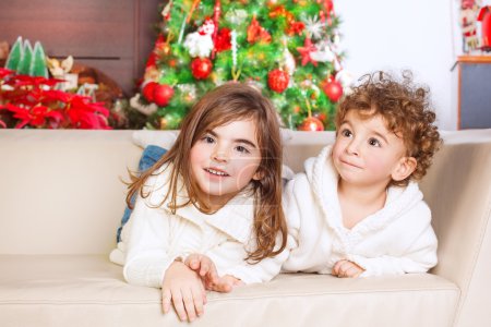 Brother and sister enjoying Christmas
