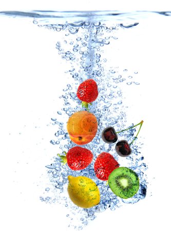 Fruit splashing into the water