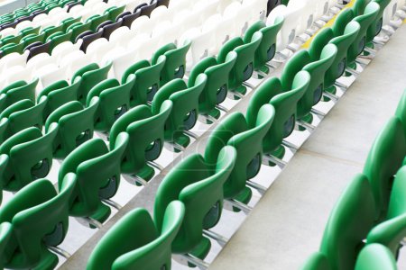 Safety plastic armchairs on stadium tribune