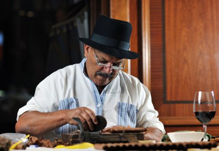 Man making luxury handmade cuban cigare