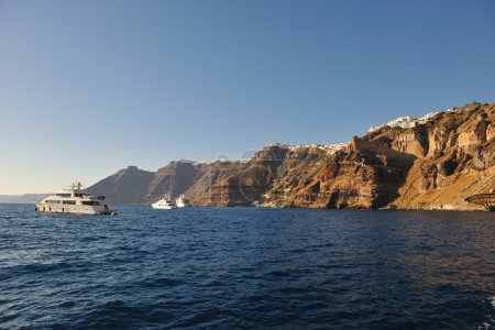 Santorini island coast with luxury yacht