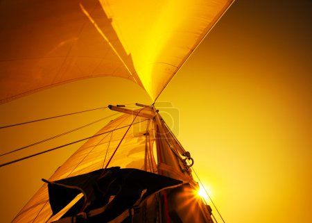 Sail over sunset