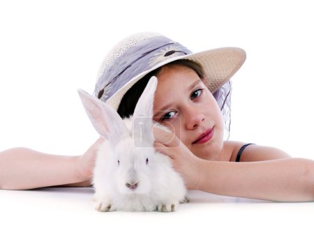 Tearful girl with her rabbit